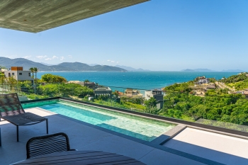 Casas que conversam com o horizonte em uma mesma essência